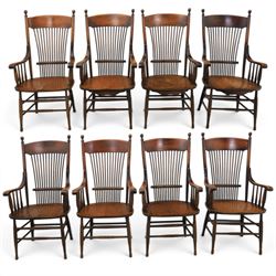 Set of eight 19th century ash and elm spindle back Windsor armchairs, arched top rails abo...