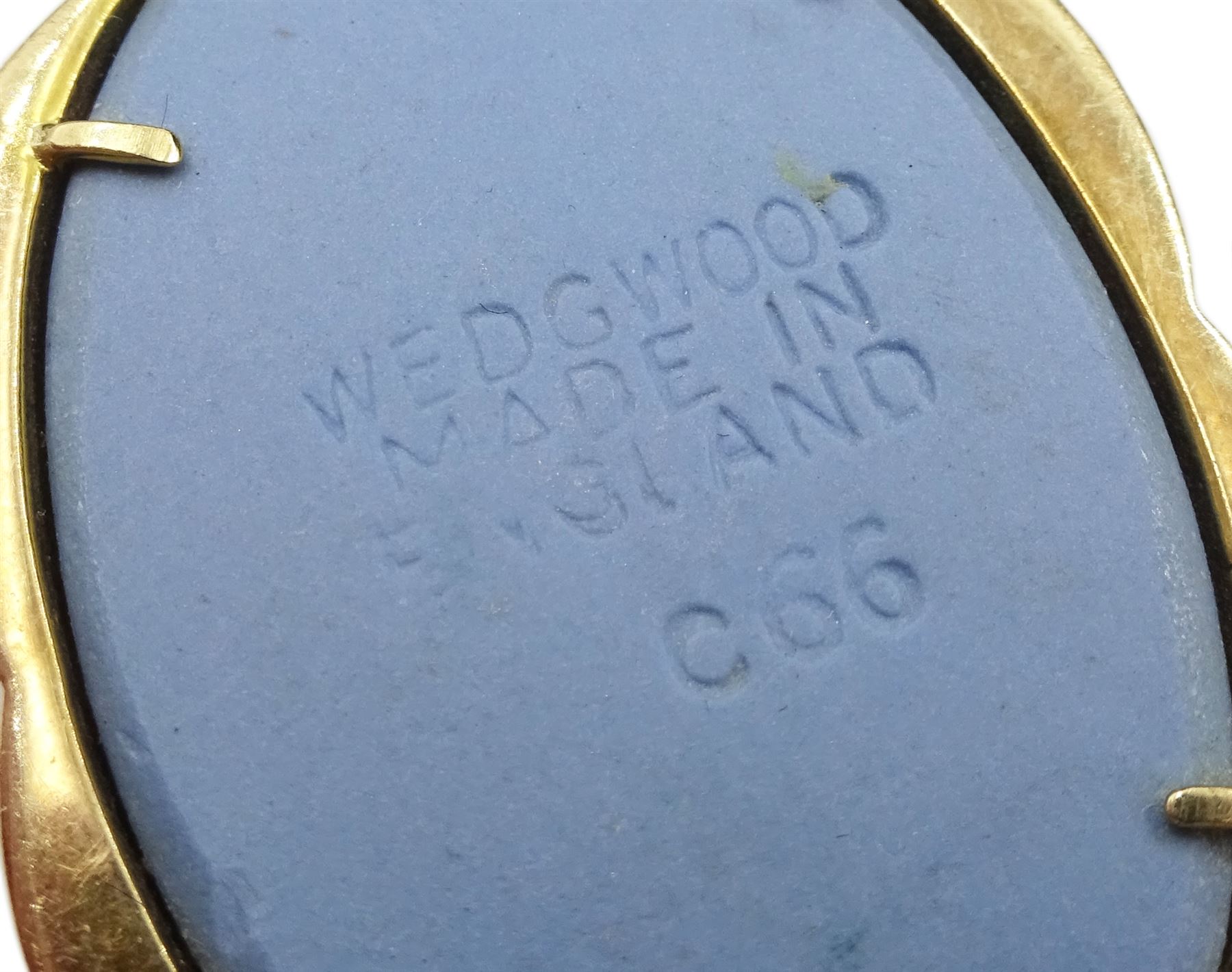 Wedgewood Jasperware jewellery including two 9ct gold brooches, silver brooch and pendant necklace and a 9ct gold cameo ring