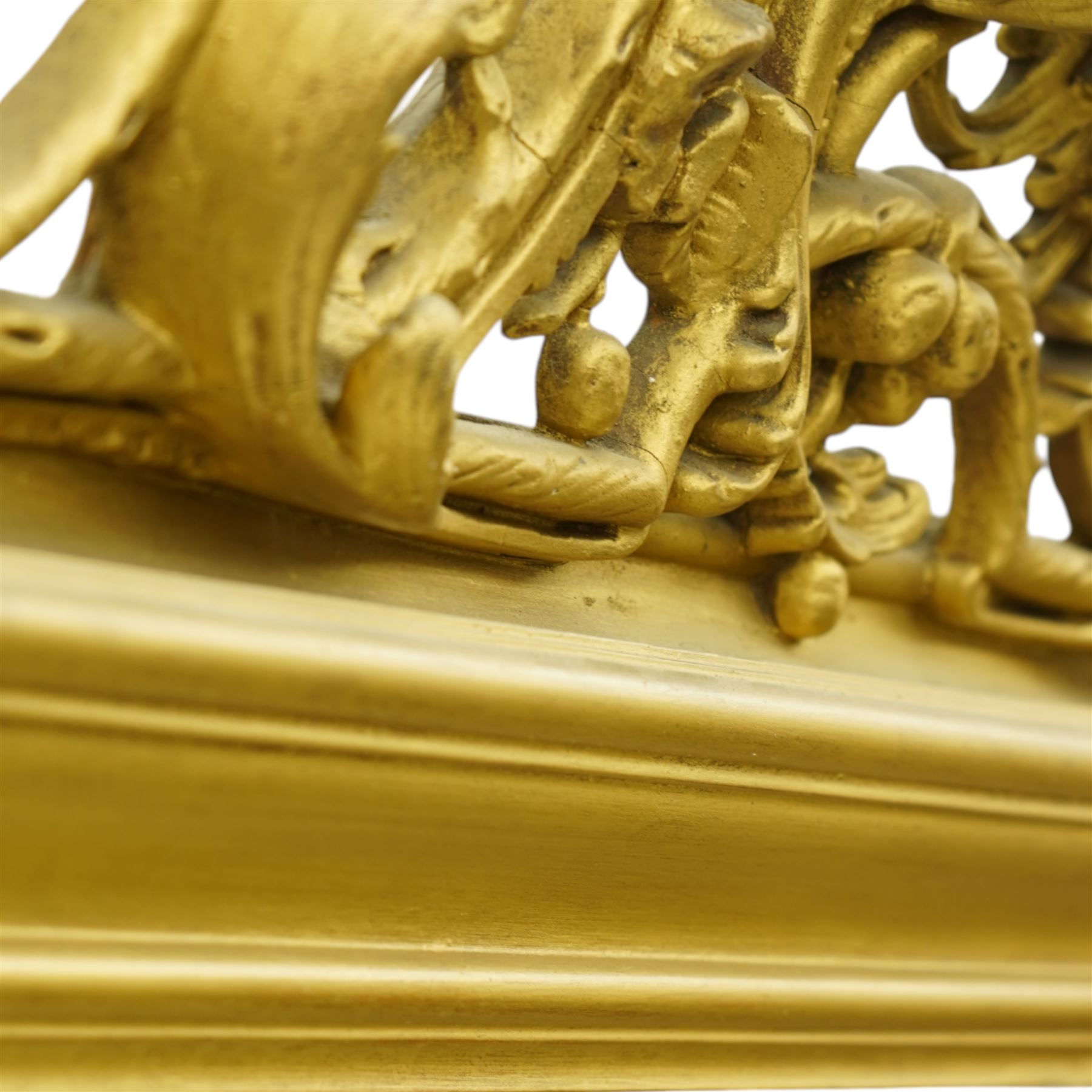 19th century Rococo Revival large gilt framed mirror, with bevelled rounded rectangular plate enclosed by a carved giltwood frame, surmounted by pierced scroll and foliate cresting, floral and scroll details to sides and corners