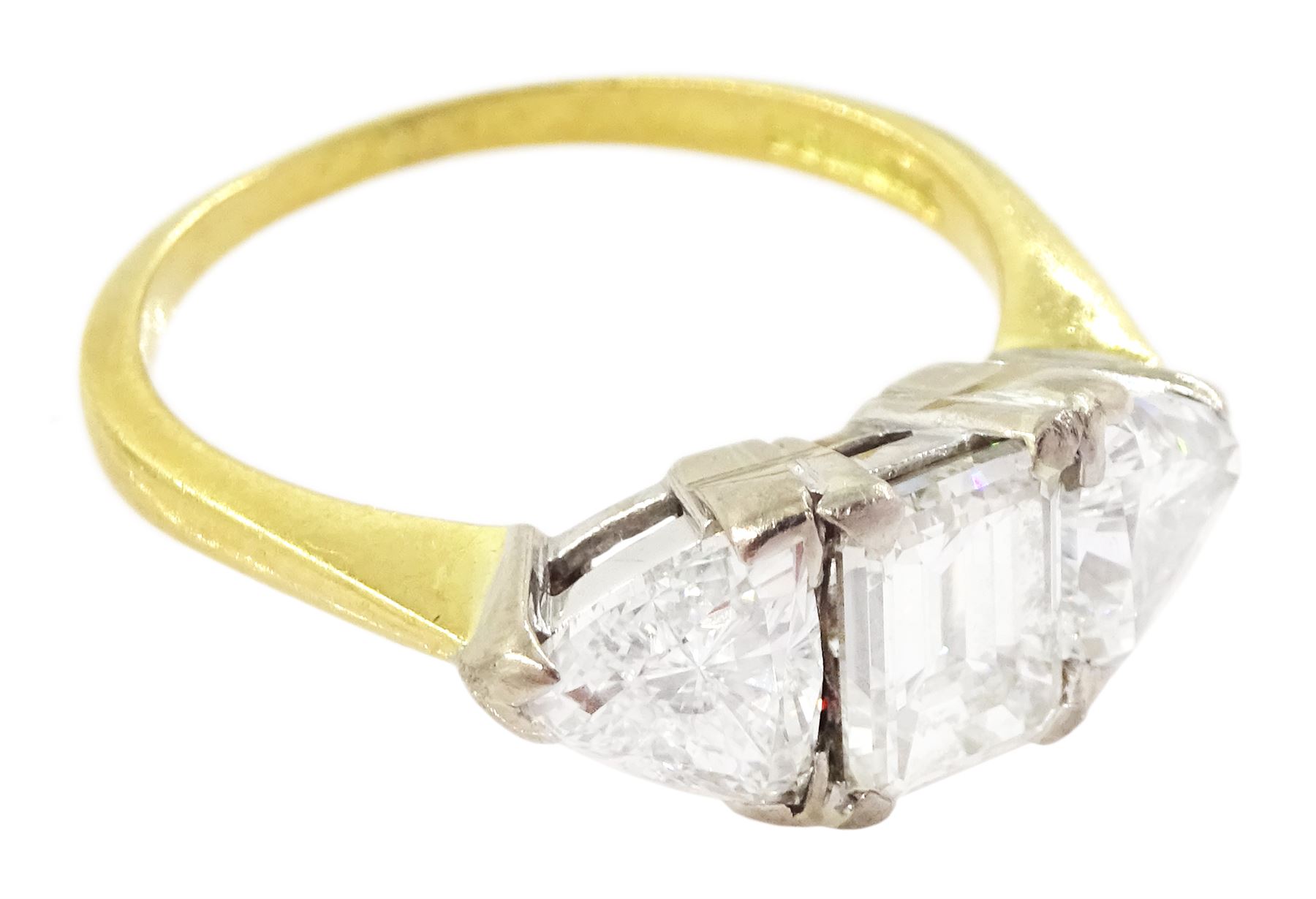 18ct gold three stone emerald cut and trillion cut diamond ring, Birmingham 1998, principal diamond approx 1.15 carat, each trillion cut diamond approx 0.80 carat, total diamond weight approx 2.75 carat