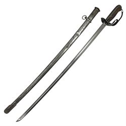 WW2 Japanese Model 1899 Type 32 'Ko' pattern cavalry sword, with 82.5cm single edged, slightly curved blade with narrow fuller, numbered 33825 to the ricasso; steel hilt with chequered backstrap and grip ears with wooden chequered grip and leather finger loop; locking action; in steel scabbard with single hanging ring L99.5cm overall