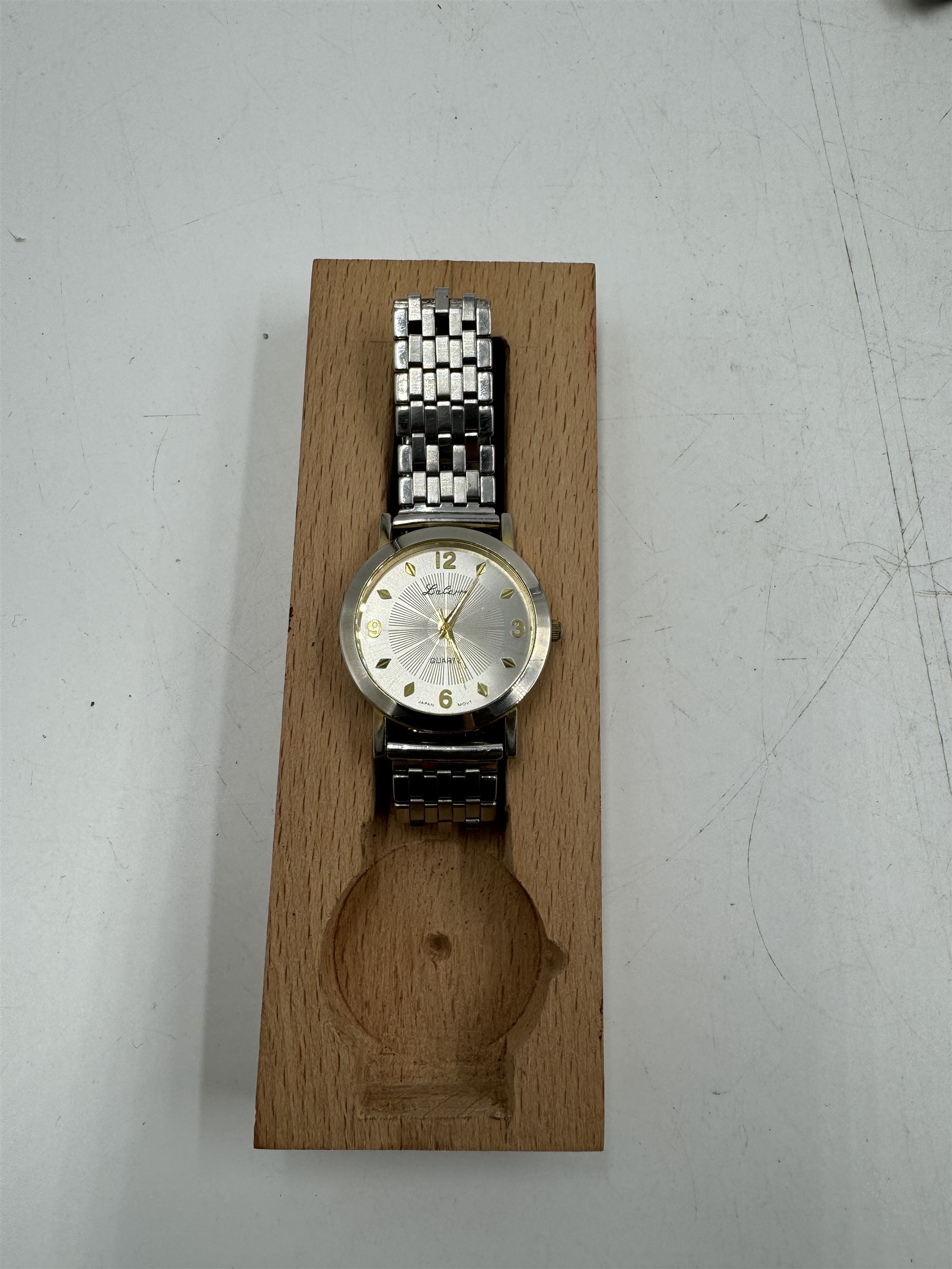 Six gentleman's wristwatches, including Avia, La Carre and Le Chat examples, together with a Smiths shockproof stop watch and a Sekonda stop watch, and a collection of spare watch straps