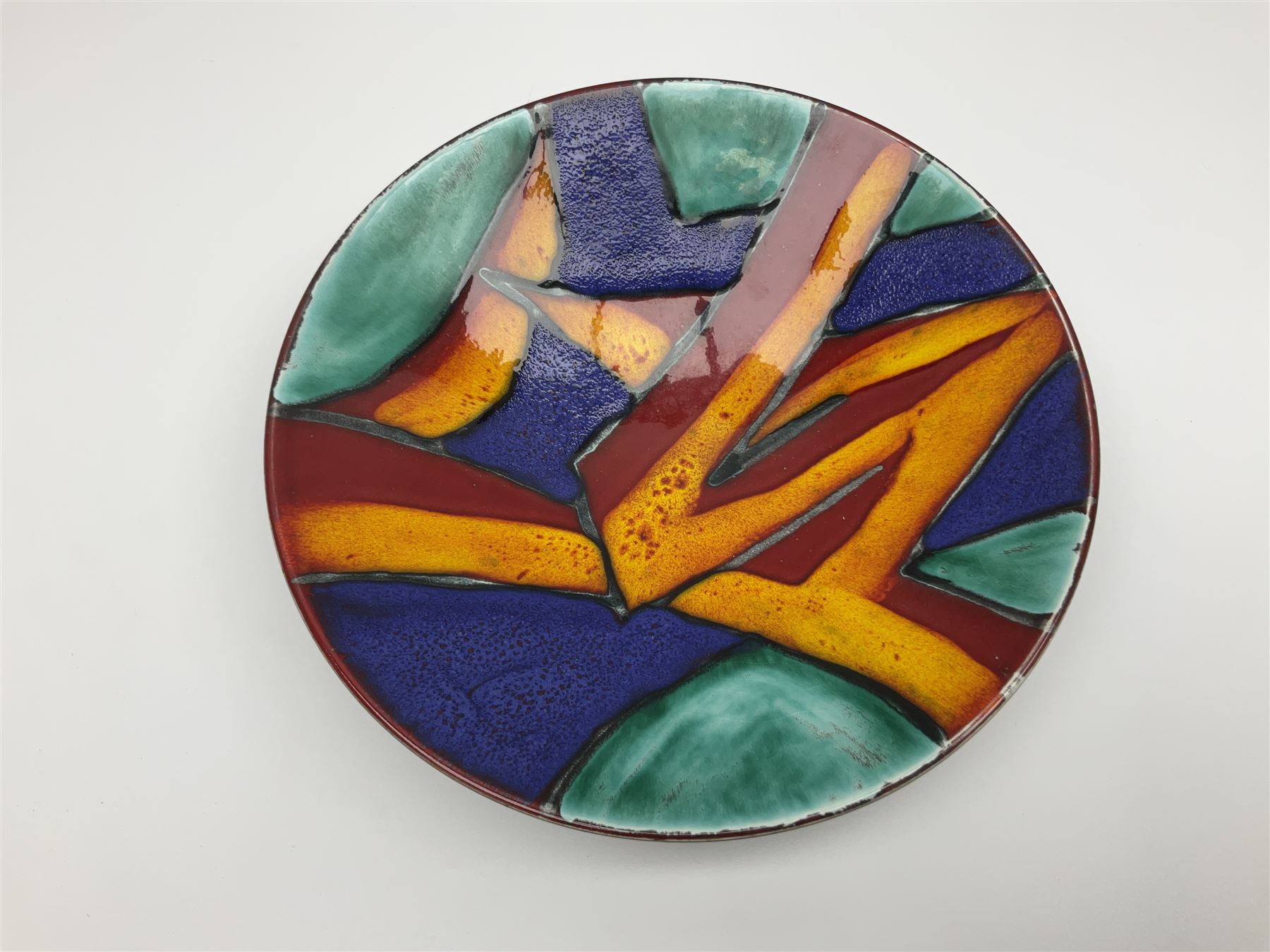 Four pieces of Poole Pottery in Graffiti pattern, comprising pair of vases of baluster form, dish and small plate, with impressed or printed marks beneath, vase H17cm