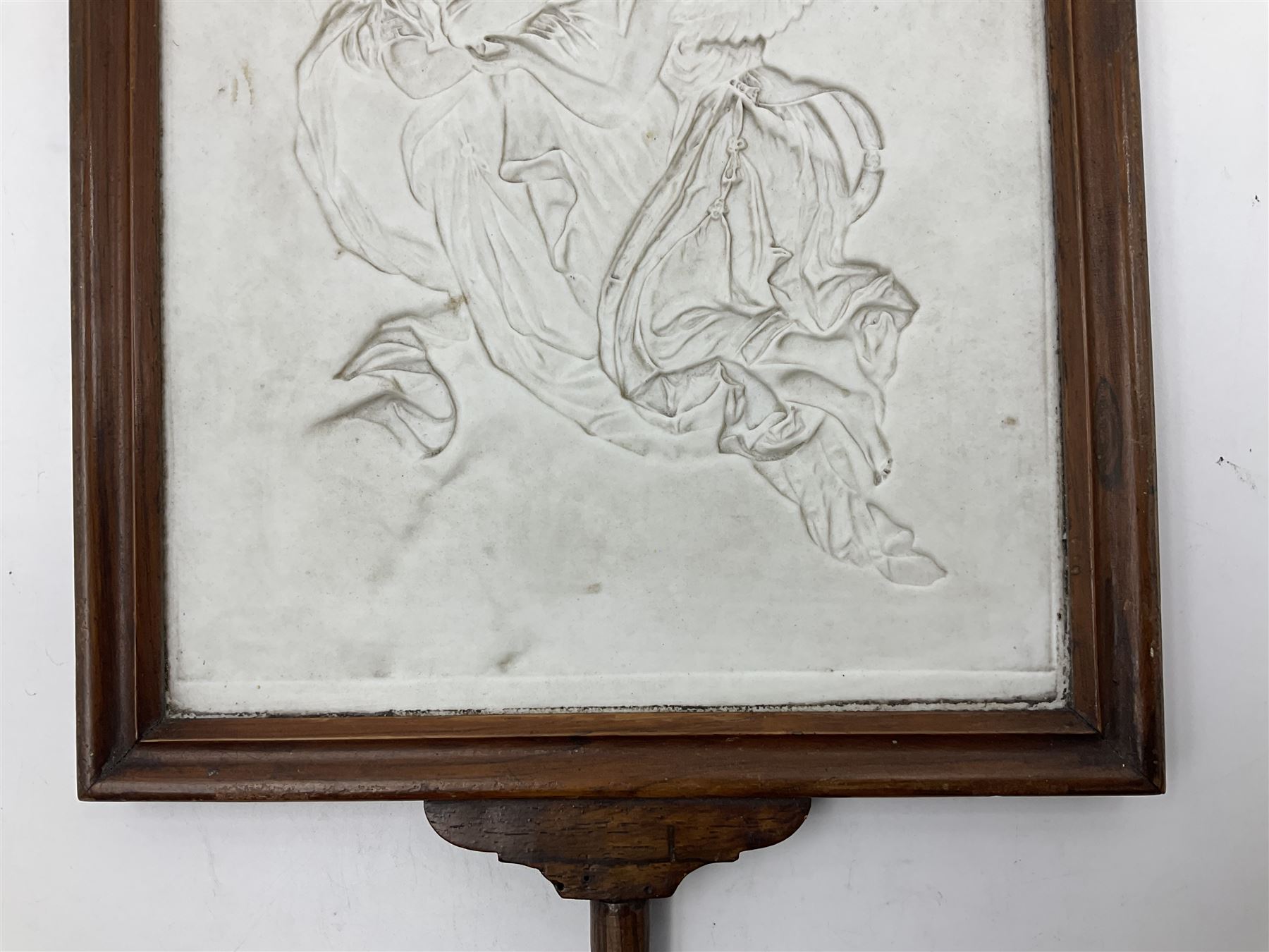 KPM Berlin lithophane panel, of two angels supporting a female figure to the centre, encased in a rosewood frame and handle, H42cm