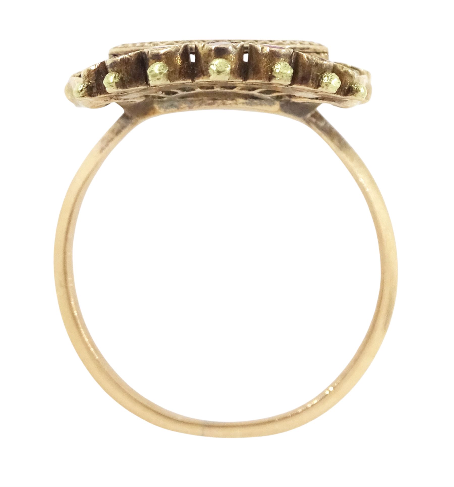 19th century 18ct gold portrait ring, set with an octagonal miniature of a woman wearing a pink dress on ivory, under a glazed panel, within a milled bezel and garnet surround, surmounted by a coronet set with seed pearls and further garnets. This lot has been registered for sale under Section 10 of the APHA Ivory Act