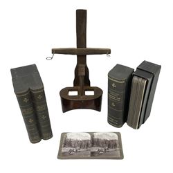 Early 20th century hand held slide action stereoscope viewer, Underwood & Underwood, publishers: The South African War through the stereoscope, stereo photographs mounted on card and captioned, in two double volume book form boxes with title labels and Underwood & Underwood  publishers: Hunting series through the stereoscope, stereo photographs mounted on card and captioned, in a single volume book form box   