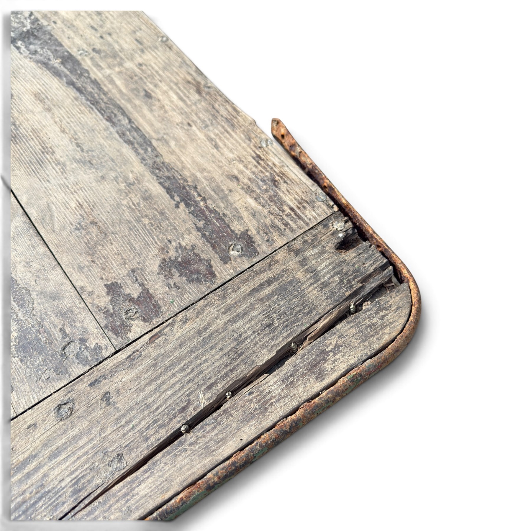 Large early 20th century plank-built wooden river punt, the long tapering hull with enclosed fore and aft decks, open green-painted ribbed interior, together with two paddles