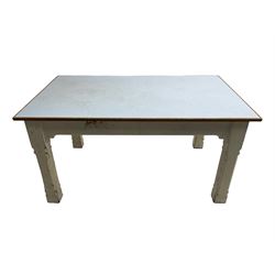 Early 20th century oak school dining table, rectangular top with linoleum surface, raised on white painted square chamfered supports 