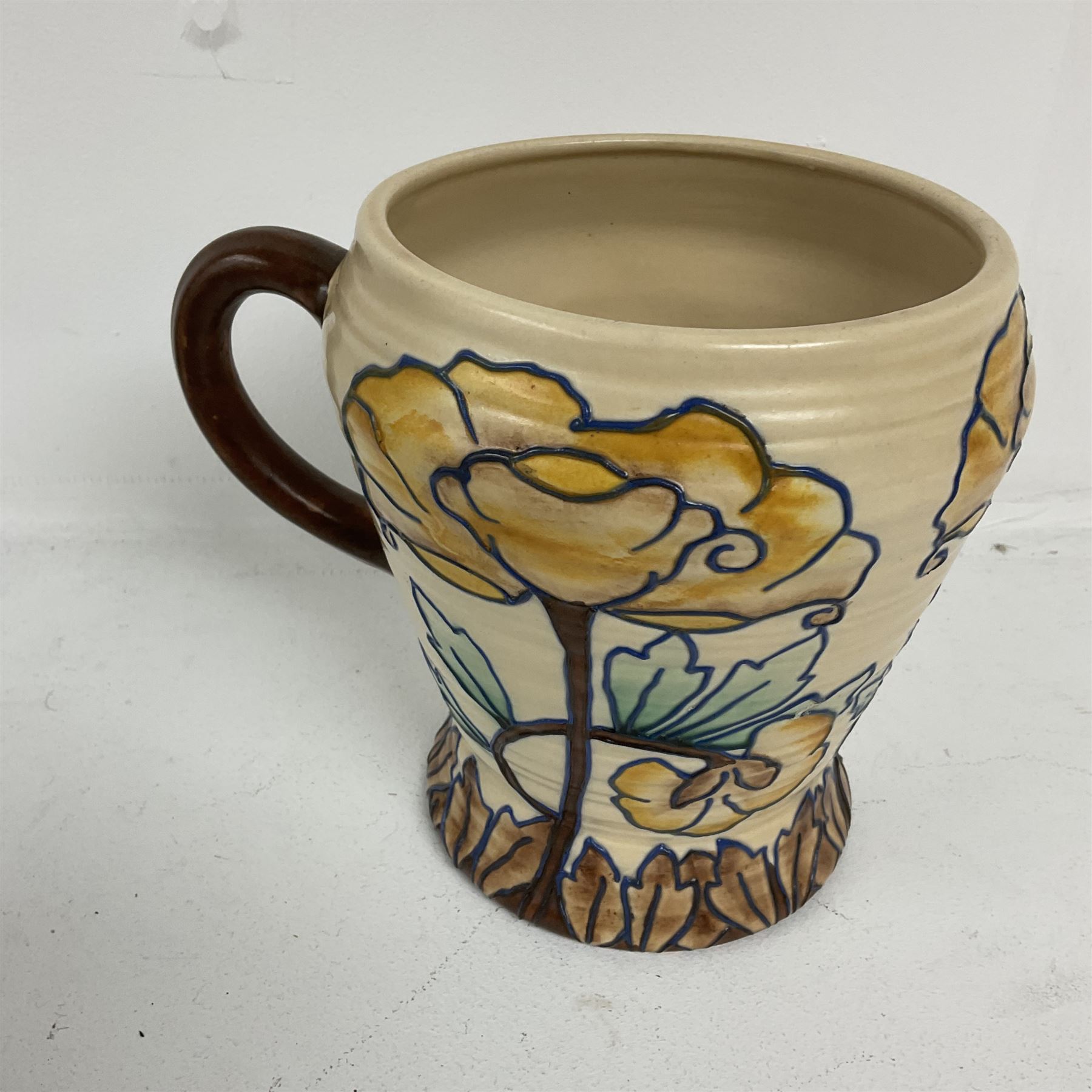 Royal Cauldon single handled vase of tapering form tube lined with a floral pattern by Edith Gater H17cm