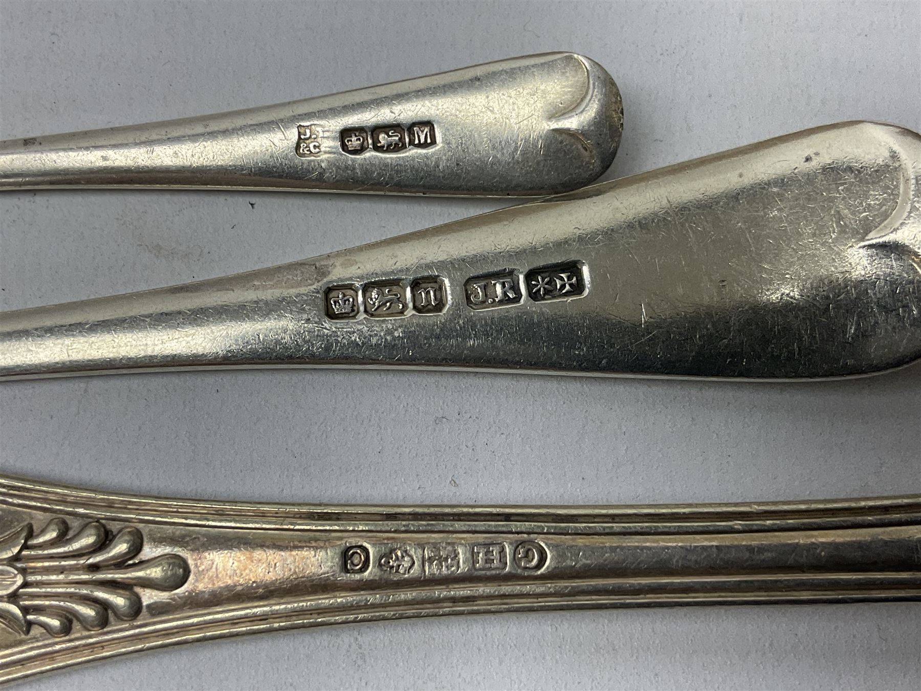 Edwardian silver dessert fork, and silver dessert spoon, hallmarked Sheffield 1905, and 1908, together with a mid 20th century coffee spoon, hallmarked Sheffield 1954, and a silver plated Kings pattern table spoon, approximate total silver weight 108 grams