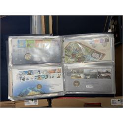 Approximately one hundred and fifteen Royal Mint coin covers, in two ring binder folders and loose, together with approximately 53 grams of Great British pre-1920 and approximately 68 grams of Great British pre-1947 silver threepence coins, and a small quantity of further pre-decimal coins