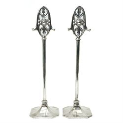 Pair of silver plated companion stands with pierced oval finials on square bases H53cm