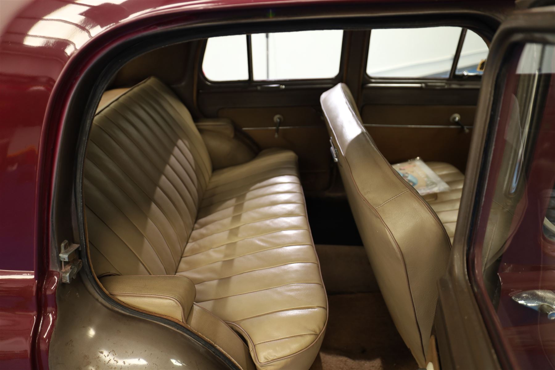 1953 Hillman Minx Saloon

Registration: NYP 135
Engine: 1,265cc petrol
Transmission: Manual, column change
Odometer reading: 37,553 miles
Colour: Maroon red
Interior: Cream
Former keepers: 3
V5C: Present
Keys: One

A 1953 Hillman Minx four-door saloon, finished in maroon red with a contrasting cream interior.

Powered by a 1,265cc petrol engine with manual column-change transmission. The Smiths speedometer displays 37,553 miles, although this mileage has not been independently verified.

The vehicle has previously been restored and presents with glossy maroon paintwork, cream bench seating and a period dashboard and steering wheel. The engine bay is painted to match the exterior and appears generally tidy. The underside has been coated or undersealed in places, with the chassis, floor sections, suspension and exhaust visible in the accompanying photographs.

At the time of cataloguing, the engine turned over but did not start.

Features

• 1,265cc petrol engine
• Manual column-change transmission
• Right-hand drive
• Four-door saloon body
• Maroon red exterior
• Cream bench-seat interior
• Smiths instrumentation
• Period dashboard controls
• Steel wheels with chrome hubcaps
• Chrome bumpers and exterior trim
• Rear-hinged bonnet
• Leaf-spring suspension

History and Documentation

• V5C registration document present
• Three former keepers recorded
• One key
• Pitman’s handbook included

Condition

The vehicle is presented in restored condition. The maroon paintwork retains a good overall gloss, with some age-related marks and imperfections visible on closer inspection.

The cream interior presents well overall, with signs of age and use to the upholstery, carpets, dashboard and controls. Some surface deterioration and pitting are visible to areas of the chrome and brightwork.

The engine bay appears tidy, although some wiring and ancillary components appear non-original or subsequently renewed. The underside has received protective coating or underseal in areas. Prospective purchasers should inspect the structure, chassis, floor, suspension and mechanical components carefully.

At the time of cataloguing, the engine turned over but did not start. The vehicle has not been mechanically inspected or road tested by the auctioneers.

Prospective purchasers should satisfy themselves as to the vehicle’s condition, specification, originality, mileage, identity and roadworthiness before bidding.

This vehicle forms part of the Estate of the Late John Sills and is offered for sale by the Executors, confirming a genuine reason for sale.
