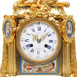 Charpentier & Cie-French 8-day mantle clock c 1860, in an ormolu case with Sevres style plaques, fluted pedestal case decorated with acanthus leaves and floral swags, surmounted by a putto and raised on toupie feet, convex enamel dial with Roman numerals, minute track and five-minute Arabic's, with makers name and Louis XVI style gilt hands, Parisian twin train movement with rack striking, sounding the hours and half-hours on a bell. With pendulum and key.
Charpentier & Cie, operated in Paris from around 1830 to 1860. They are especially well-known for their clock and garniture sets, as well as for their works of bronze. With pendulum and key.


