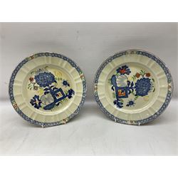 Pair of Mason's Ironstone plates decorated in the jardinière pattern, together with Mason's set of three graduated jugs in the Regency pattern, ironstone jug decorated in the Imari palette and Portmeirion Parian ware jug moulded with cherubs