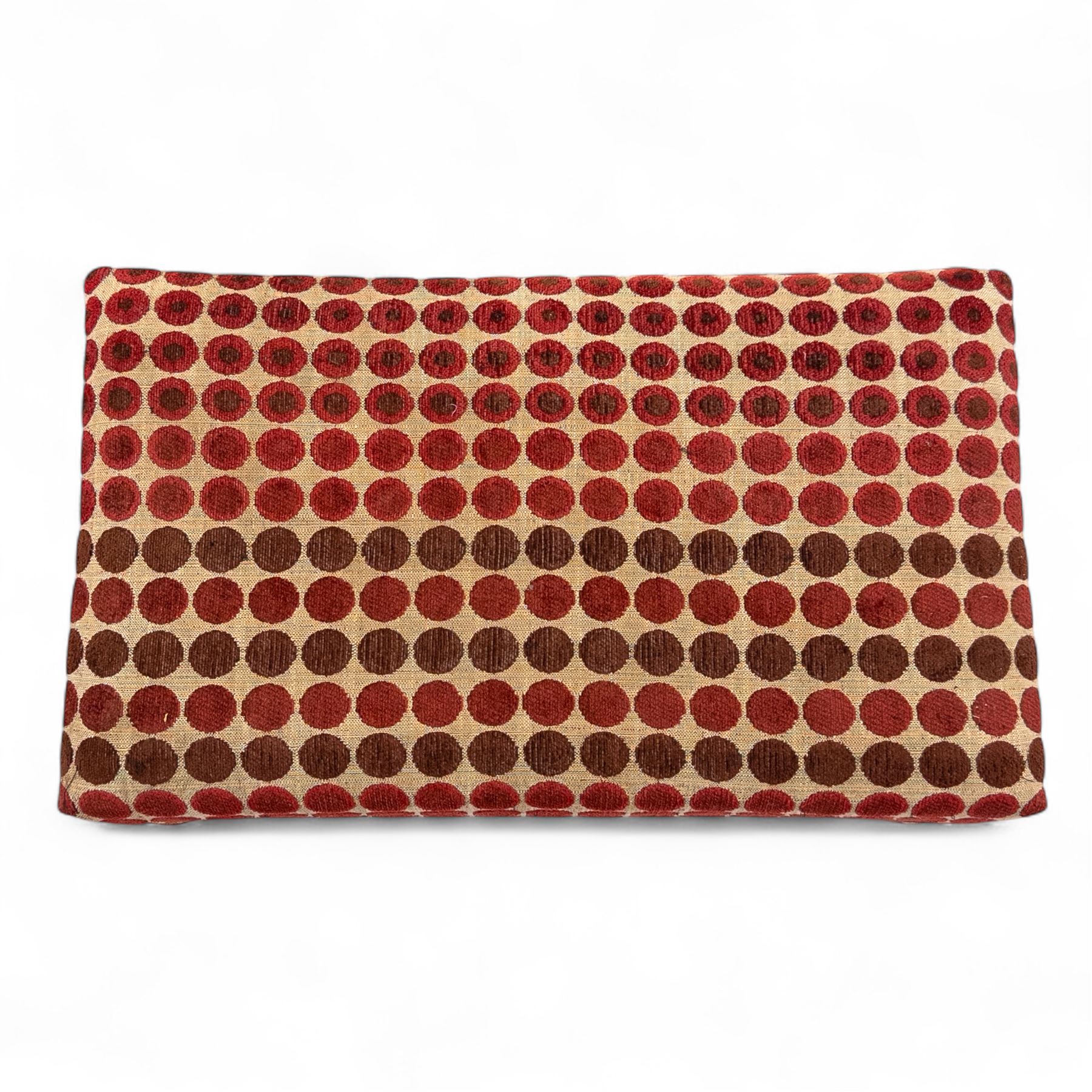 Late 20th century Georgian style wingback armchair with matching footstool, upholstered in red and cream geometric fabric, raised on cabriole front legs