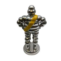 Polished aluminium Michelin man figure, H33.5cm.