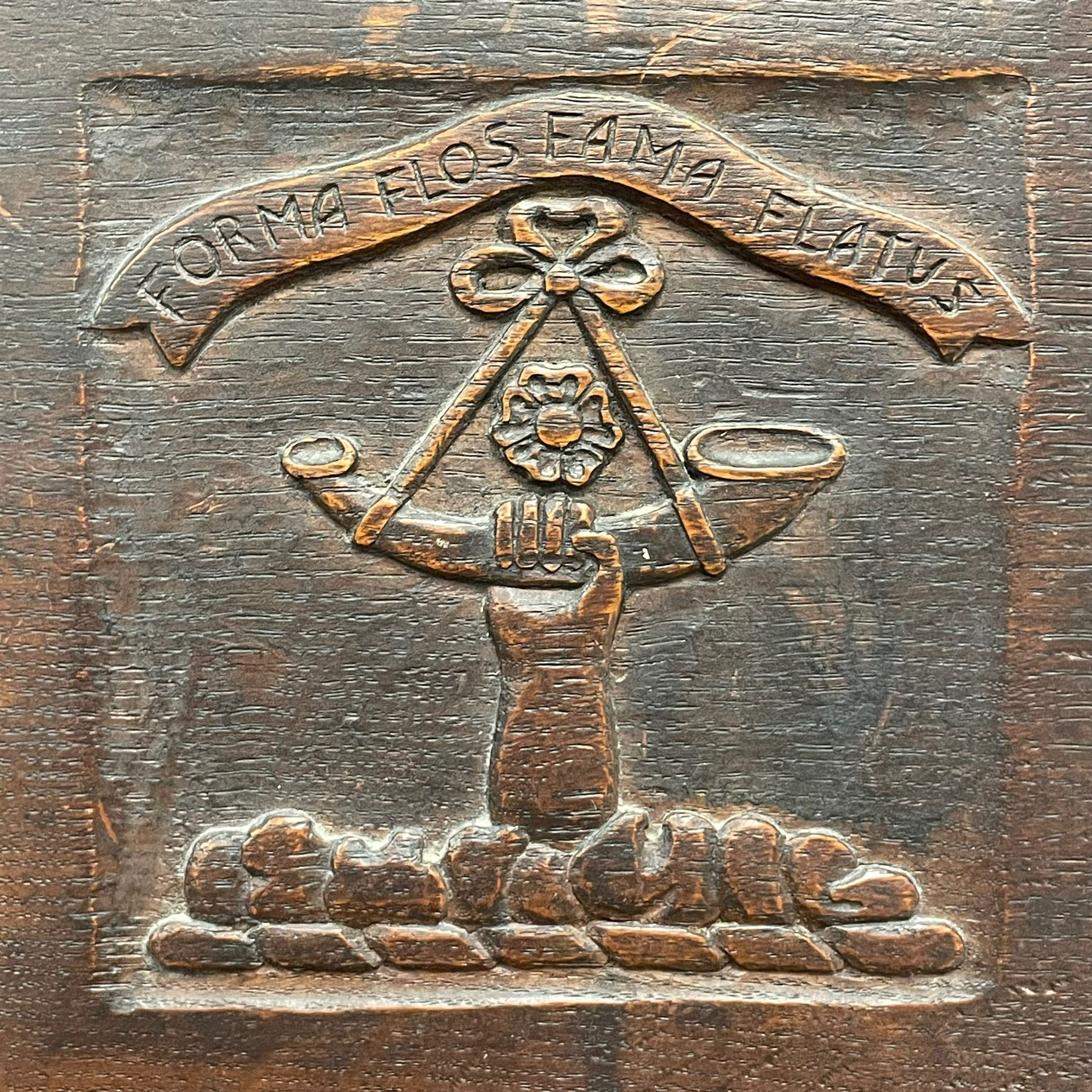 Mouseman - circa. 1930s set of six (4+2) oak dining chairs, panelled back carved with the Bagshawe family crest, the moto 'Forma Flos Fama Flatus' over an arm grasping a bugle-horn with ribbon tie and Yorkshire rose motif, adzed frame, leather lattice strap seat, on octagonal supports united by stretchers, two carvers and four side chairs, each carved with mouse signature, by Robert Thompson of Kilburn 

Provenance: Owned since manufacture by the Bagshawe family, descendants of the Staithes Group Artist Joseph Richard Bagshawe RBA (1870-1909).