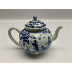 Two late 18th/early 19th century Chinese export teapots, the largest example of globular form with curved handle and straight spout, decorated in the Mandarin style with figural scenes surrounded by red scale reserves, H13.5cm, the second smaller example decorated in underglaze blue with two musicians in a landscape set with willow tree and fence, H10.5cm

