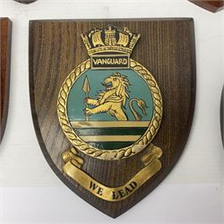 Six Naval wall shields, including HMS President, Vanguard, HMS Kilmorey etc, and another plaque 