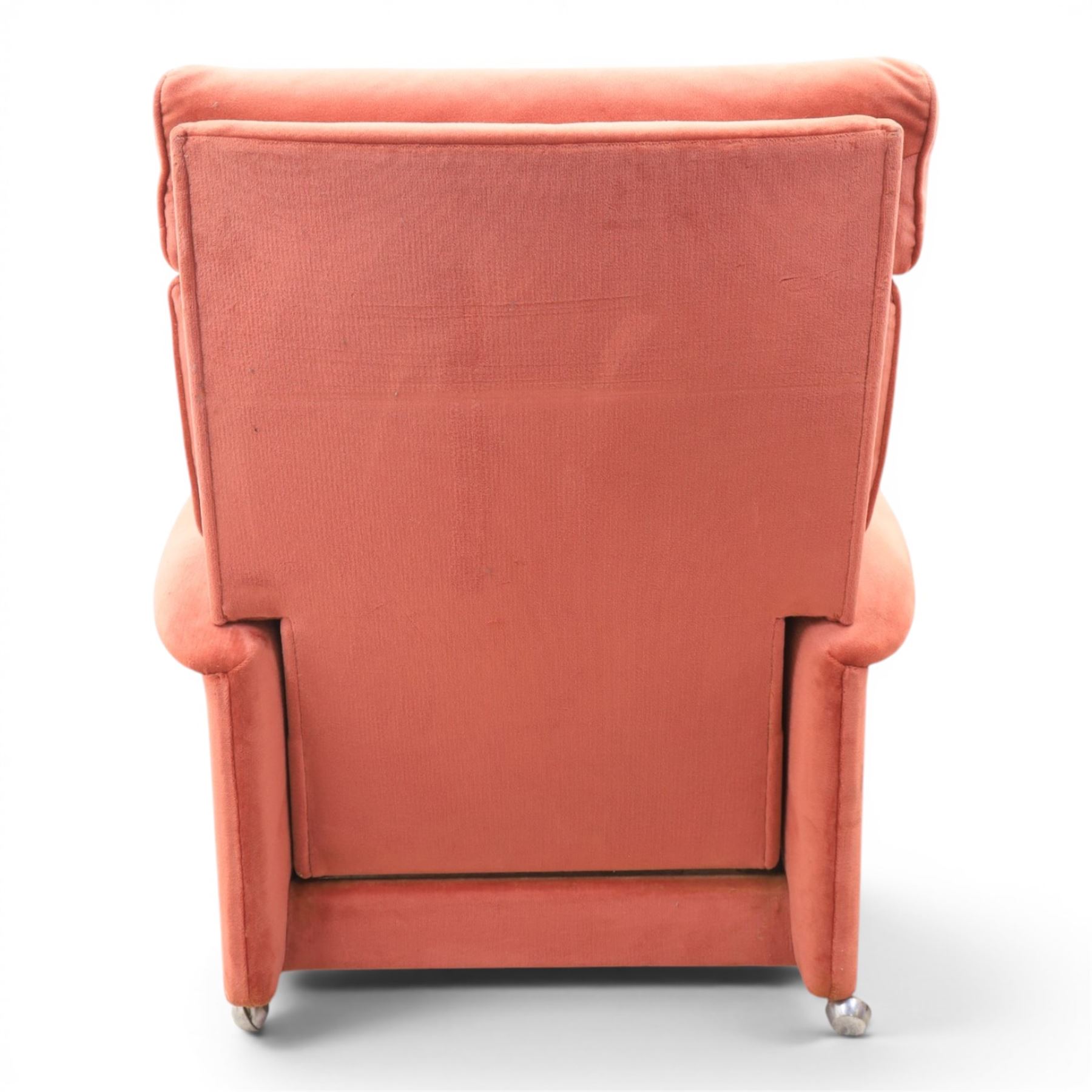 Parker Knoll - mid-century armchair suite, 'Model N30' recliner armchair with headrest and deep buttoned seat and back raised on castors, a wide armchair with deep button back and seat raised on castors, a wingback chair with flared scrolled arms, raised on cabriole supports