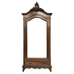 Mid-to late 20th century French walnut armoire wardrobe, shaped top with carved shell cartouche pediment with extending floral and foliate decoration, enclosed by bevel glazed door, fitted with single drawer, shaped scroll carved apron on foliate carved cabriole feet with scrolled terminals, with hanging rail