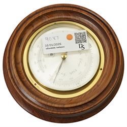 American-early 20th century drop dial wall clock with a 20th century quartz wall clock and small aneroid barometer.  