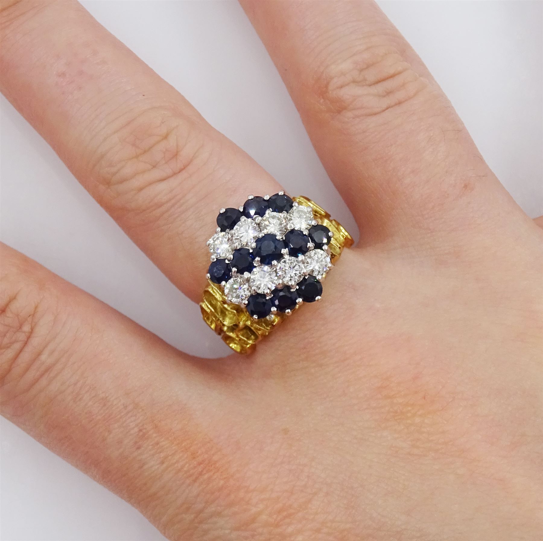 18ct gold sapphire and round brilliant cut diamond cluster ring, total diamond weight approx 0.65 carat