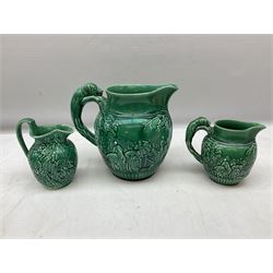 Three Wedgwood Of Etruria majolica jugs together with three majolica dishes
