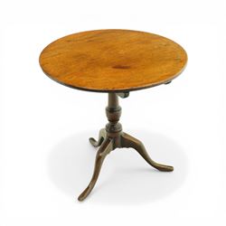 19th century mahogany circular tilt top occasional table, the dished top raised on a turne...