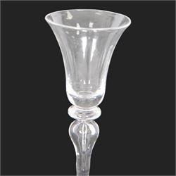 Mid 18th century wine glass, circa 1730-1740, with bell shaped bowl upon an inverted baluster stem with internal tear and basal knop, upon conical folded foot, H15cm