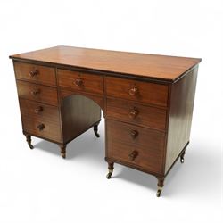 Early 19th century mahogany kneehole desk, rectangular moulded top over an arrangement of ...