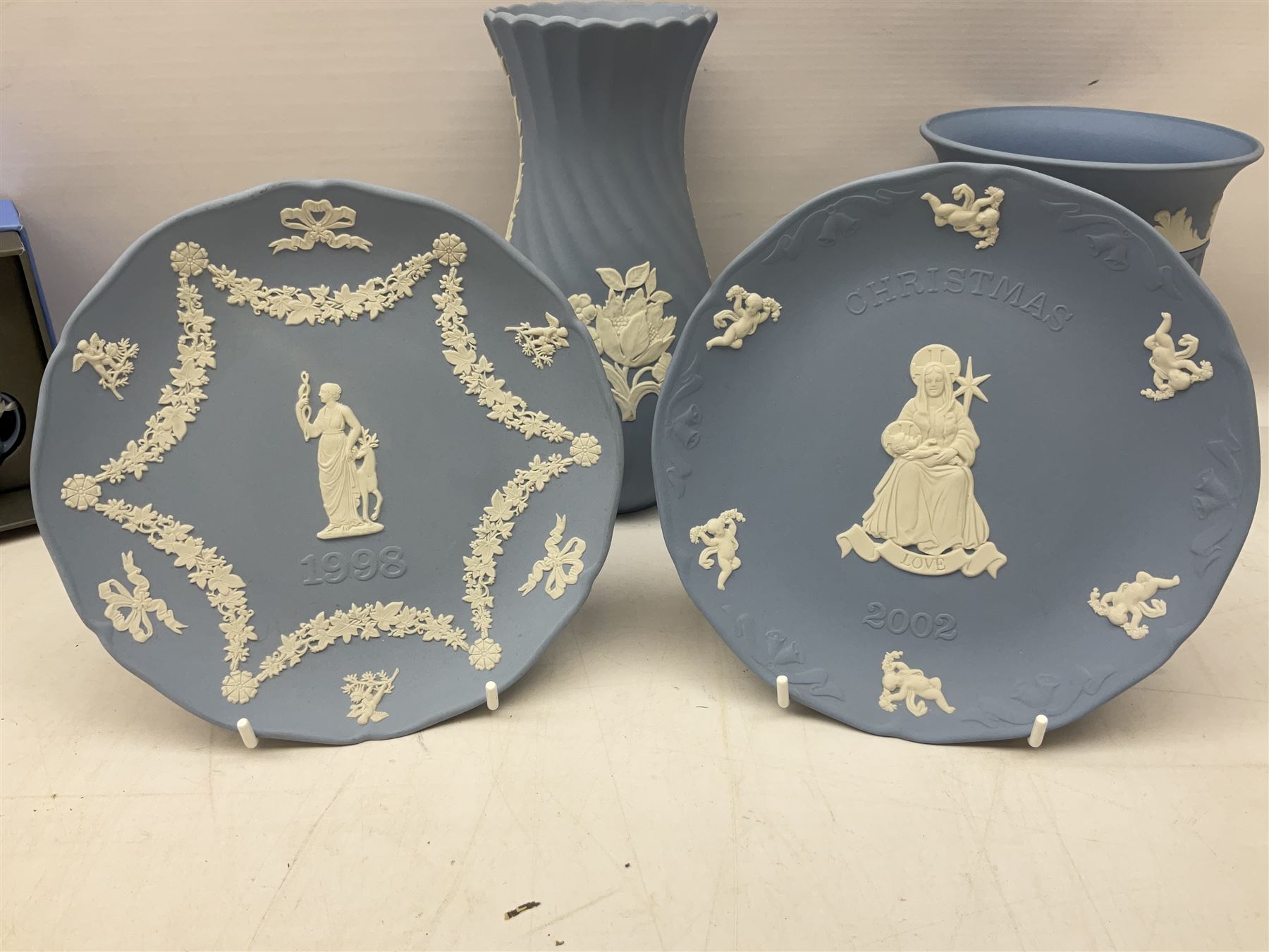 Wedgwood pale blue Jasperware, to include a pair of tulip vases, large vase with fluted rim, trinket dishes, trinket box etc, together with Wedgwood miniature hanging decoration in the form of a tea set 