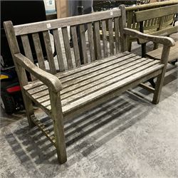 Two seater teak garden bench  - THIS LOT IS TO BE COLLECTED BY APPOINTMENT FROM DUGGLEBY STORAGE, GREAT HILL, EASTFIELD, SCARBOROUGH, YO11 3TX