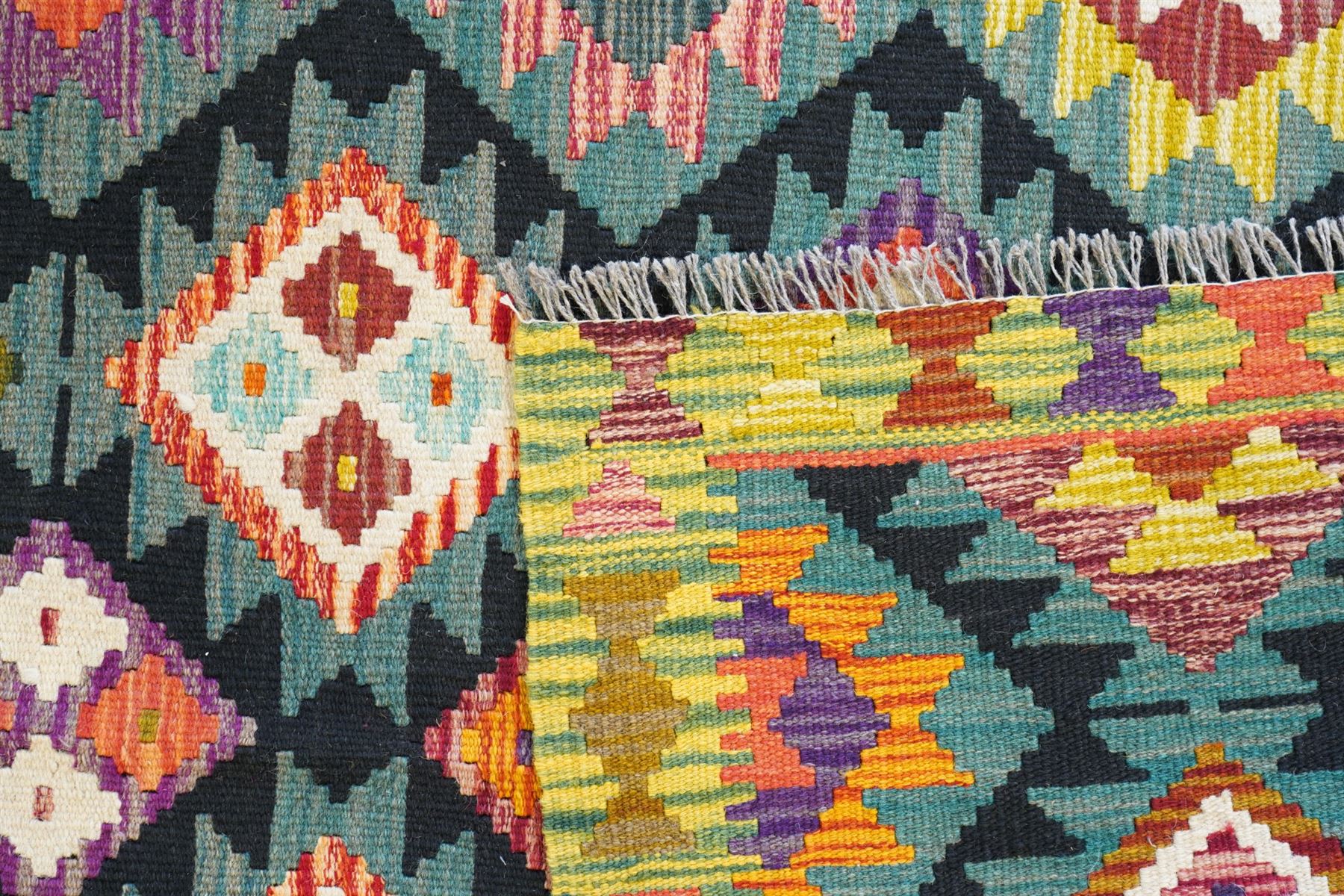 Maimana Kilim rug in shades of green, decorated with stepped lozenges 