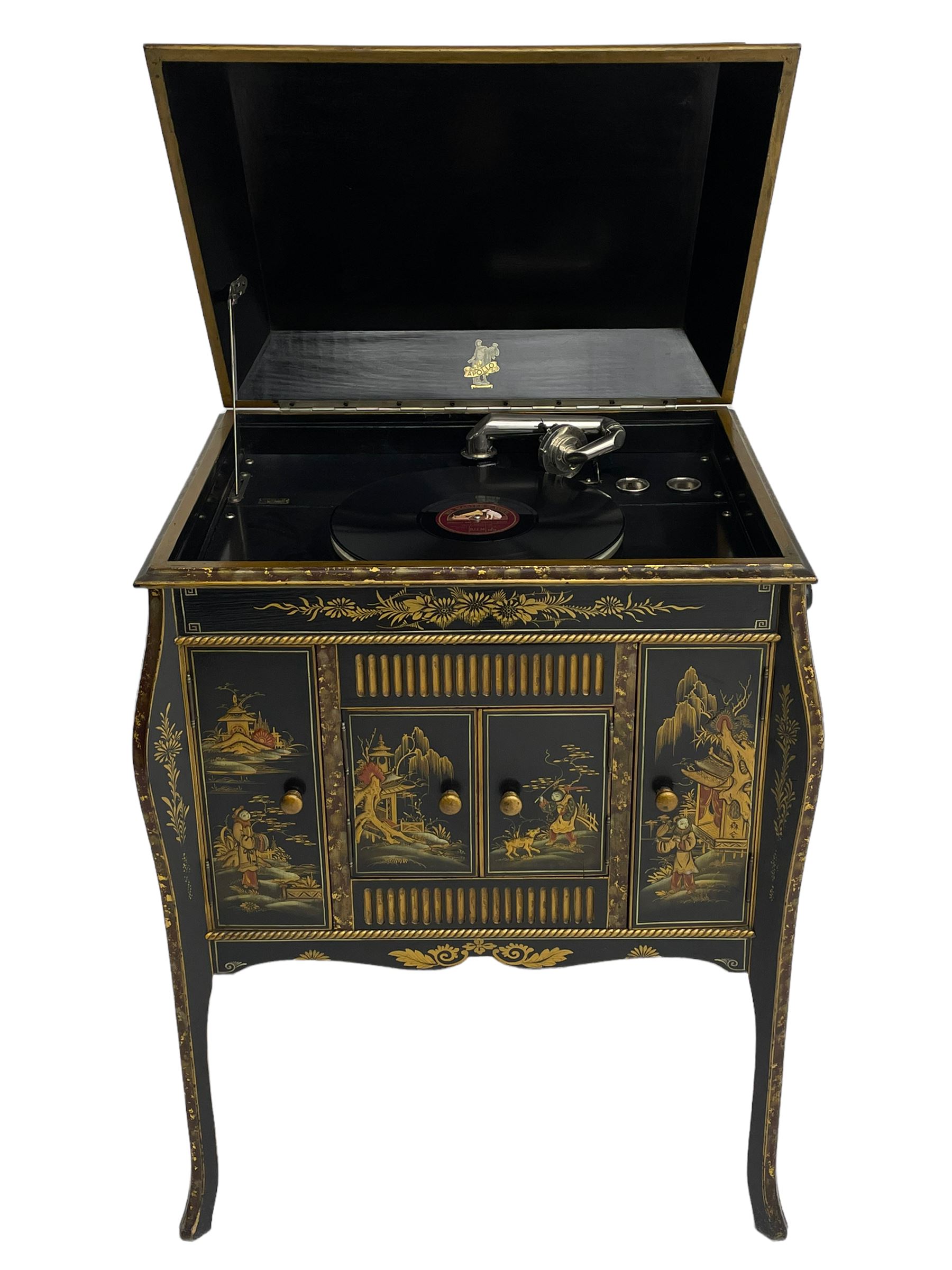 Early 20th century Chinoiserie lacquered gramophone cabinet, the lid decorated with raised gilt work, traditional landscape and figural scenes, fitted with 'Apollo' 'No. 114' gramophone, cupboards below, on cabriole supports