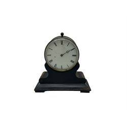 Late 19th century French Drum clock with an 8-day “tick-tack” movement, circular brass case and ebonised wooden stand, white card dial with roman numerals and steel moon hands, Parisian movement stamped VAP (Victor Athanase Pierret) with a deadbeat escapement, integral pendulum and key, wound and set from the rear.