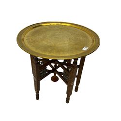 Benares carved hardwood table with brass top