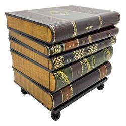 Maitland-Smith - four drawer chest in the form of a stack of leather-bound books, the top drawer with metal label inscribed 'Maitland-Smith', on turned feet