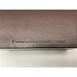 Rolex brown leather box, with decorative buckle to cover, opening to reveal wooden veneer interior, the inside lid stamped in gilded lettering 'Creation Genève Rolex', stamped beneath 'Montes Rolex S.A. Geneve Swiss 71.00.04, H8cm