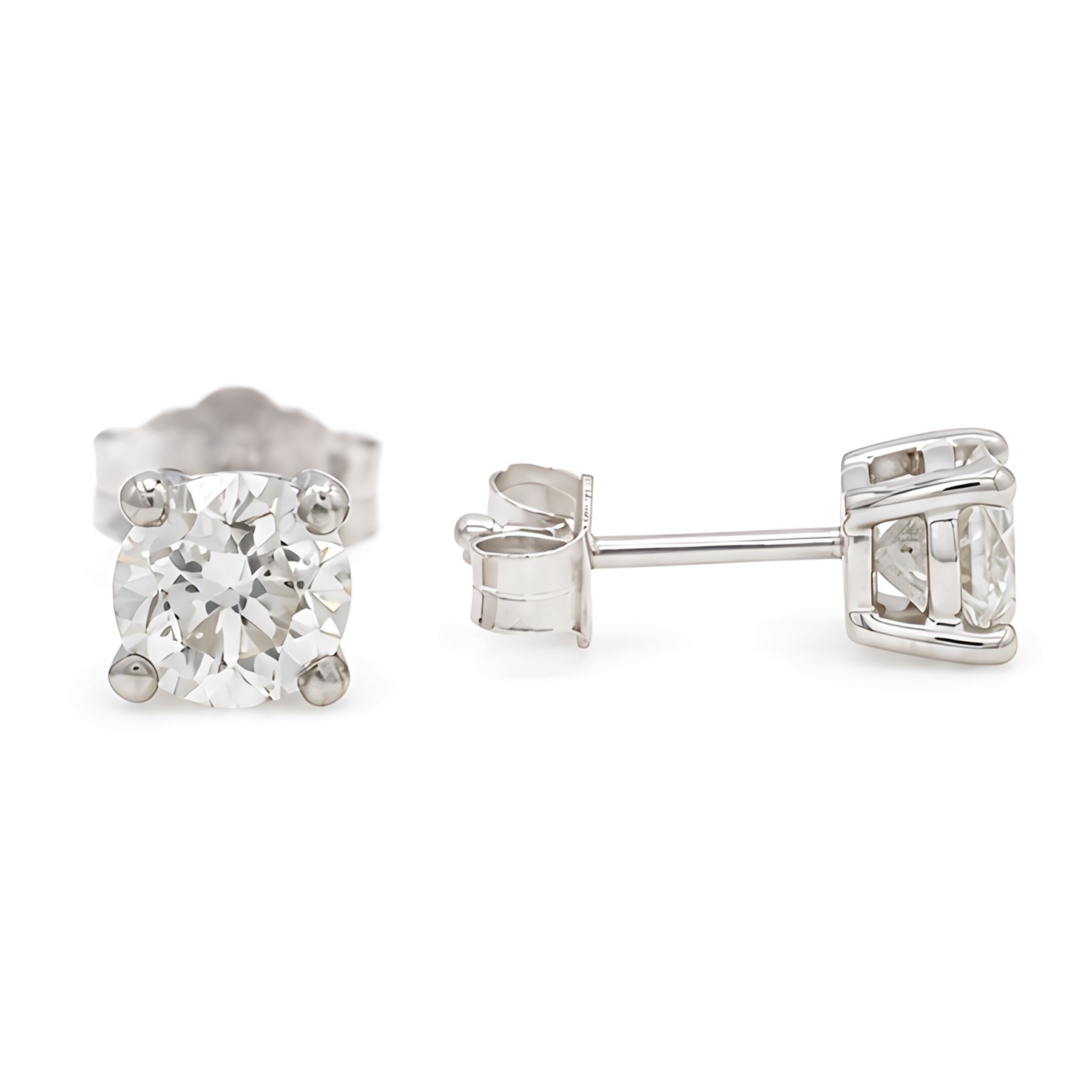 Pair of platinum diamond earrings, each stud set with a single round brilliant cut diamond, stamped PT 950total diamond weight approx 1.05 carat