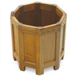 Mouseman - octagonal oak planter or log bin, with contrasting fumed oak panels, penny moulded top, with a cylindrical removable steel bucket, on eight short legs, with carved mouse signature, by the workshop of Robert Thompson of Kilburn, with 1997 original purchase receipt