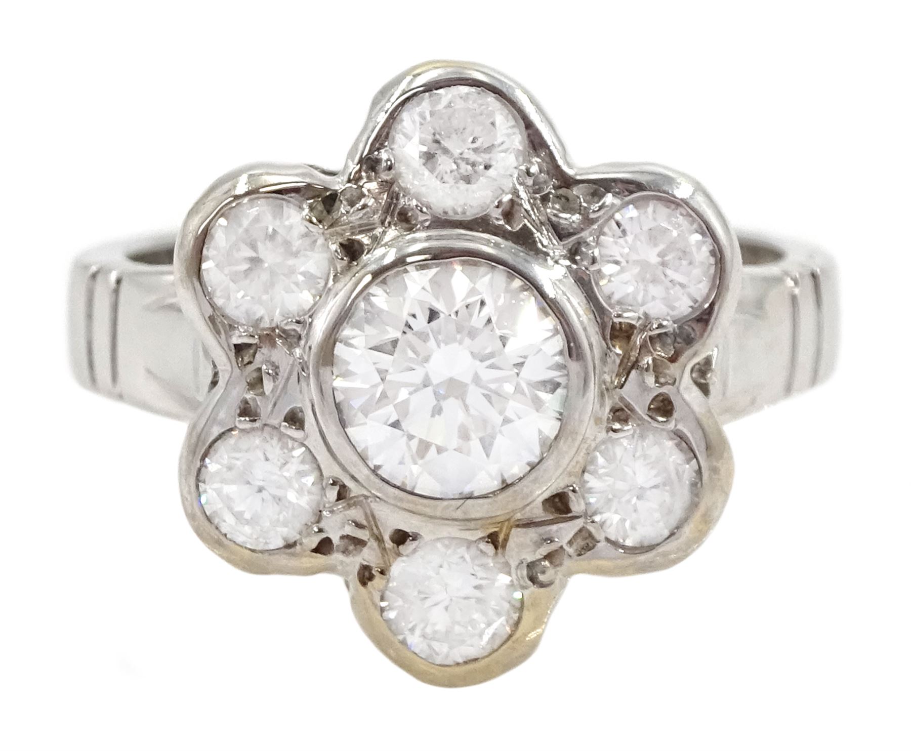 18ct white gold seven stone round brilliant cut diamond daisy flower head cluster ring, hallmarked, principal diamond 0.74 carat, with GIA report, total diamond weight approx 1.40 carat