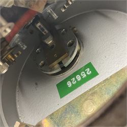 Metal cased drum shaped travelling clock with grey hammered finish, French clockwork movement and stitched leather outer case with shoulder strap; bears manuscript label 'Royal Armament Research and Development Establishment - serial no.09433' D13cm overall