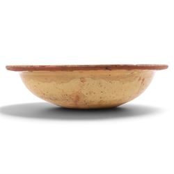 Spanish twin handled cooking pot, blackened to the outside, together with two bowls with slipware glaze, pot H22cm 