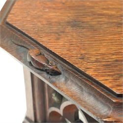 Mouseman - circa 1930s oak wedge shaped six sided plinth, of gothic design with carved berries and columnar supports, with carved mouse signature, by Robert Thompson of Kilburn