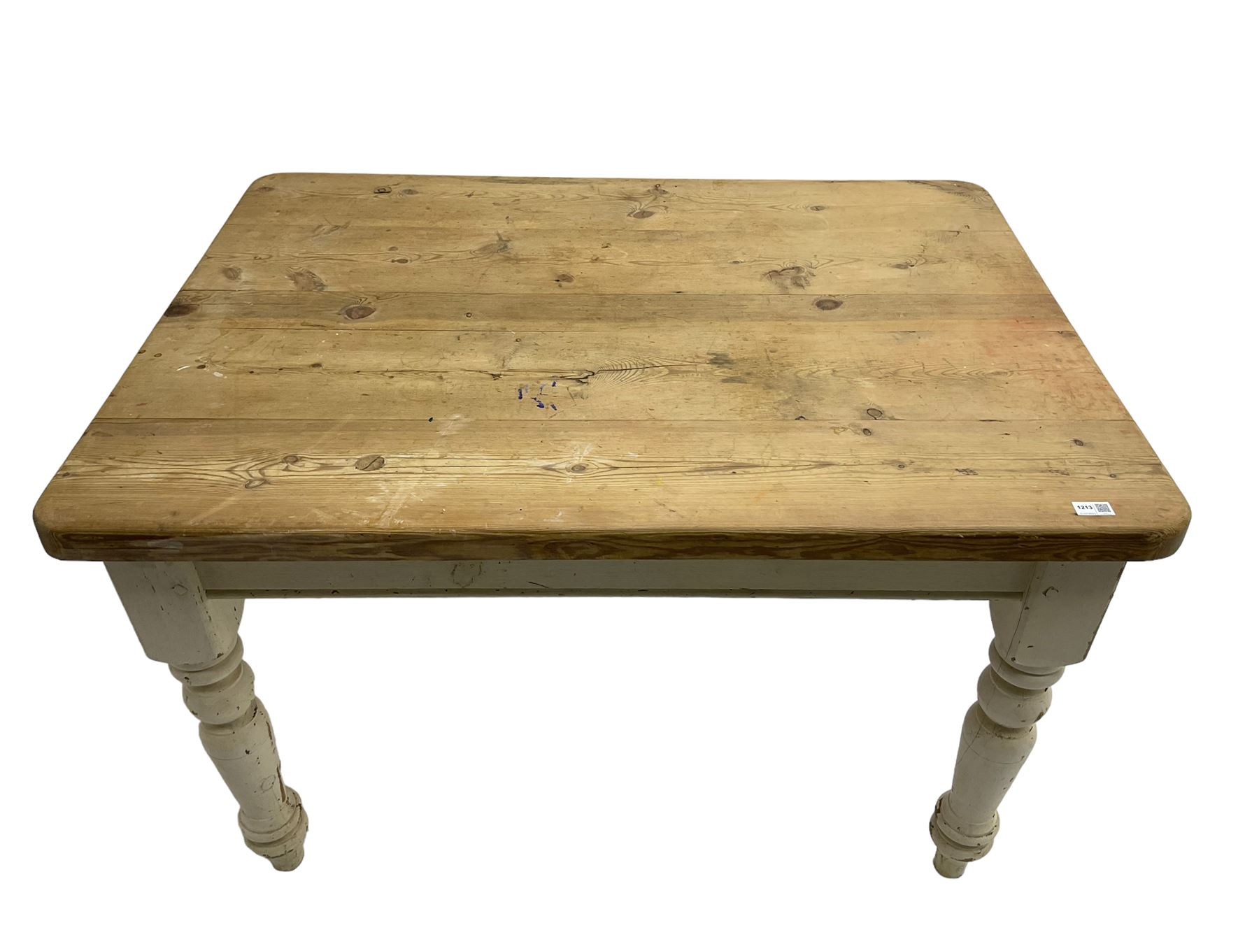 Traditional pine kitchen table with white painted base, rectangular top over single drawer, raised on turned supports