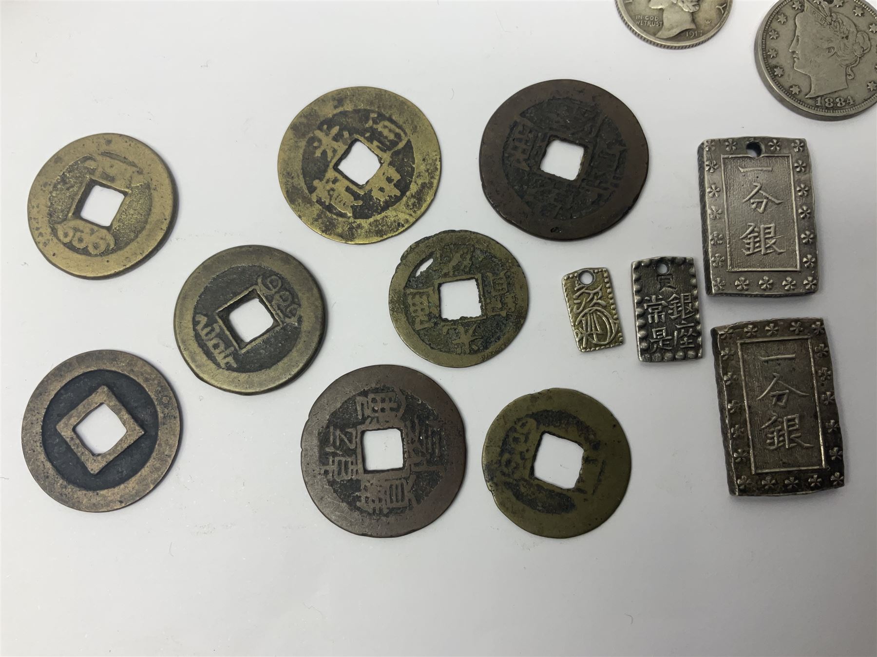 Coins, tokens, paranumismatic and miscellaneous items, including United States of America 1850 one cent, 1877 one dime, 1884 five cents, 1926 Liberty dime etc, Queen Victoria New Brunswick 1843 one penny token, East India Company 1845 half anna, Chinese cash coins, Grand Lodge of Maryland November 16th 1886 Centennial Session medallion etc