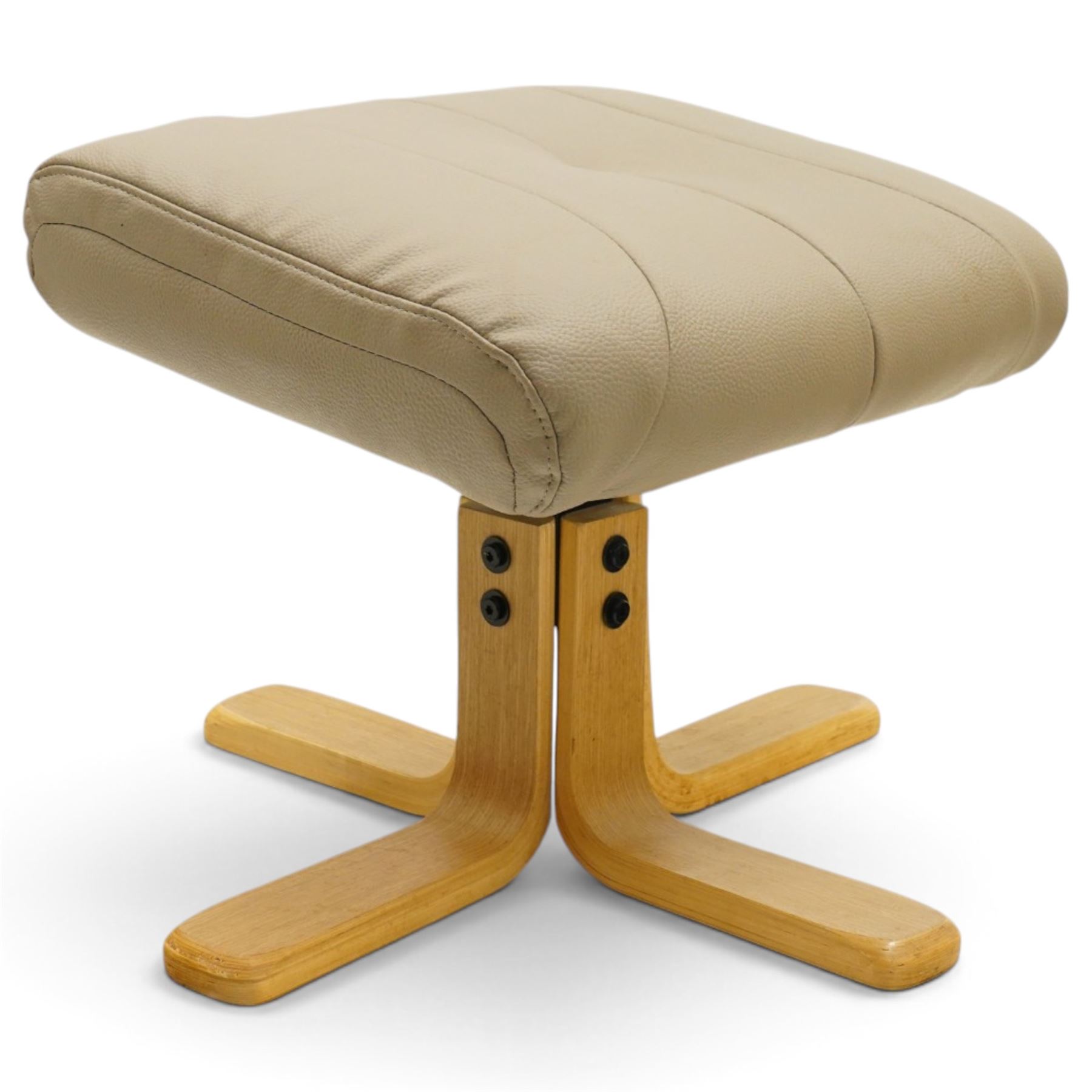 Modern beige leather upholstered swivel armchair and matching footstool, the high back and padded arms with stitched panel detail, raised on laminated beech five and four star bases