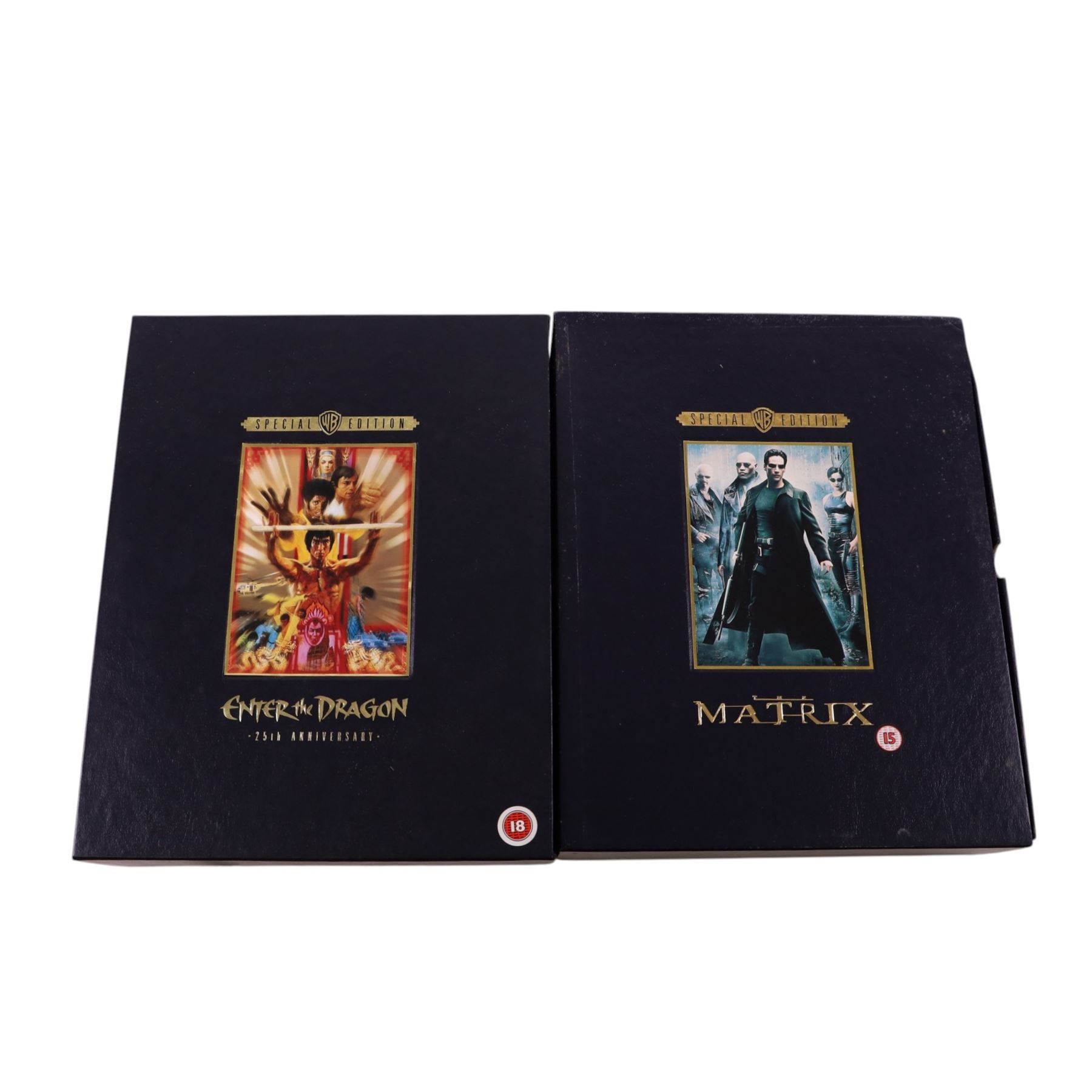 Special Edition DVDs and VHS tapes, comprising Enter The Dragon 25th Anniversary Edition DVD, The Matrix 25th Anniversary Edition DVD, The Planet of the Apes Collection VHS boxset and Star Wars Trilogy Widescreen Special Edition, together with Star Wars Chronicles book, by Deborah Fine and Aeon Inc